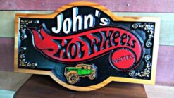 carved cedar man cave garage sign