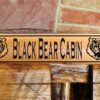 wooden cabin signs
