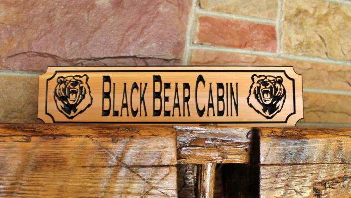 wooden cabin signs