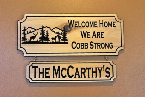 hanging cottage sign with last name