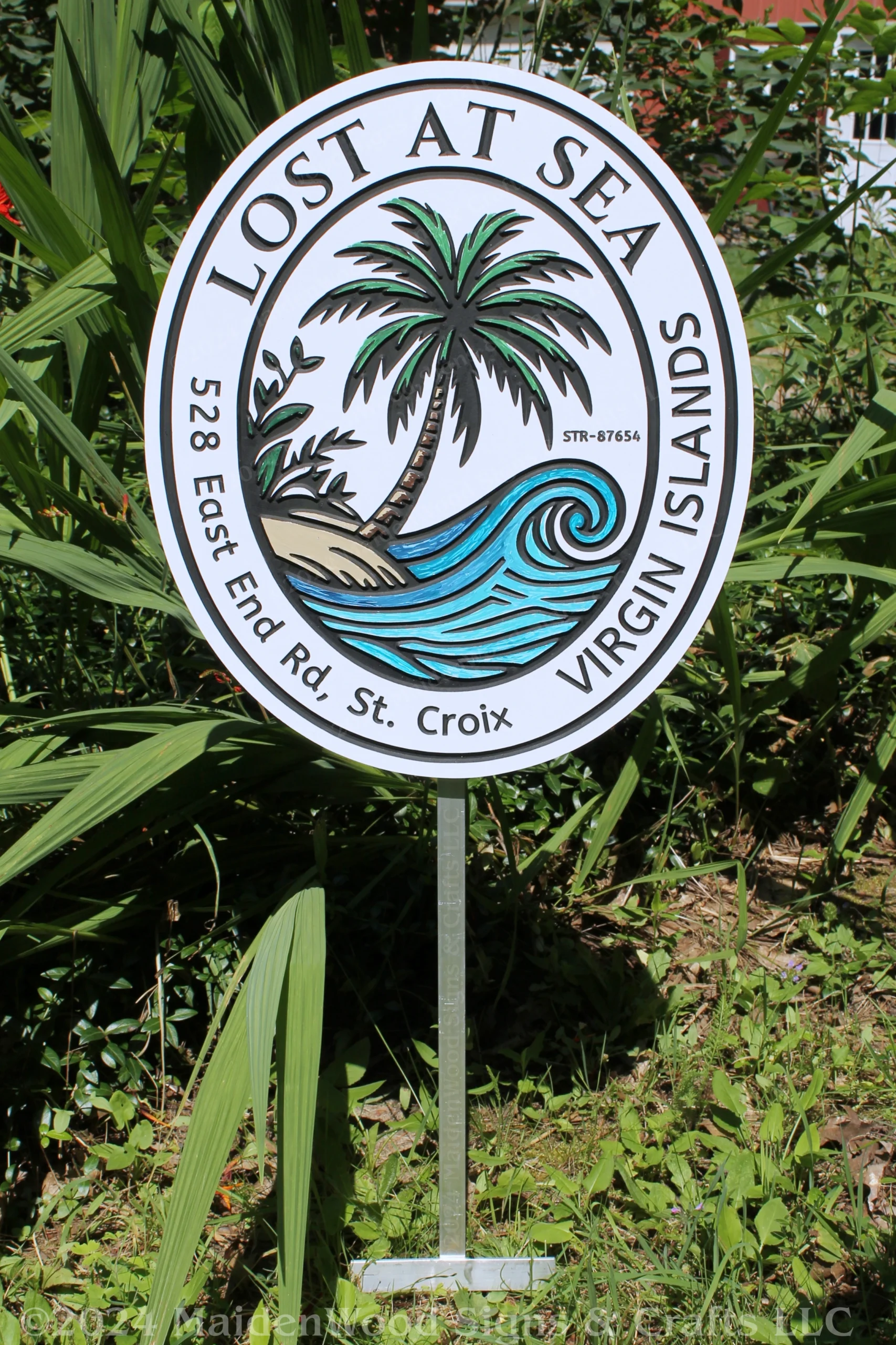 Custom tropical sign with hand-painted palm tree and ocean wave, designed for tropical-themed spaces or beach homes