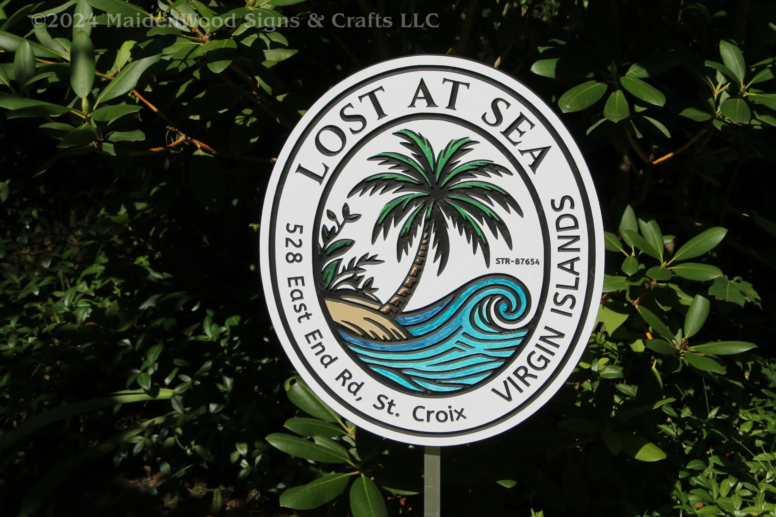 Custom vacation rental sign featuring a palm tree and wave design, perfect for personalizing your tropical getaway or beach house.
