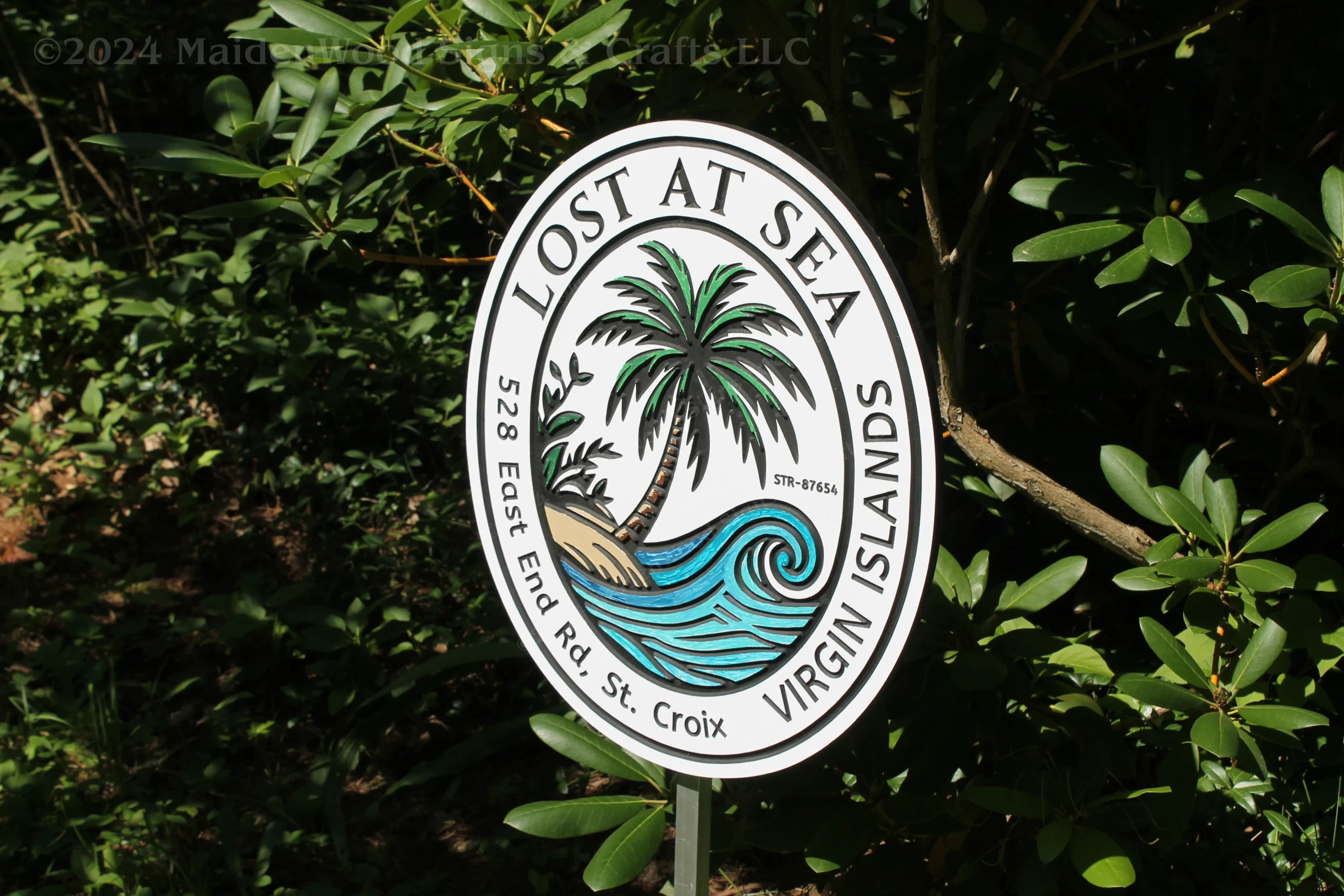 Fully customizable beach house sign with a tropical theme, featuring a palm tree and wave, perfect for personalizing your coastal property.
